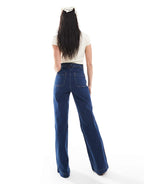 High Rise Flared Jeans with Patch Pockets in Dark Blue Wash