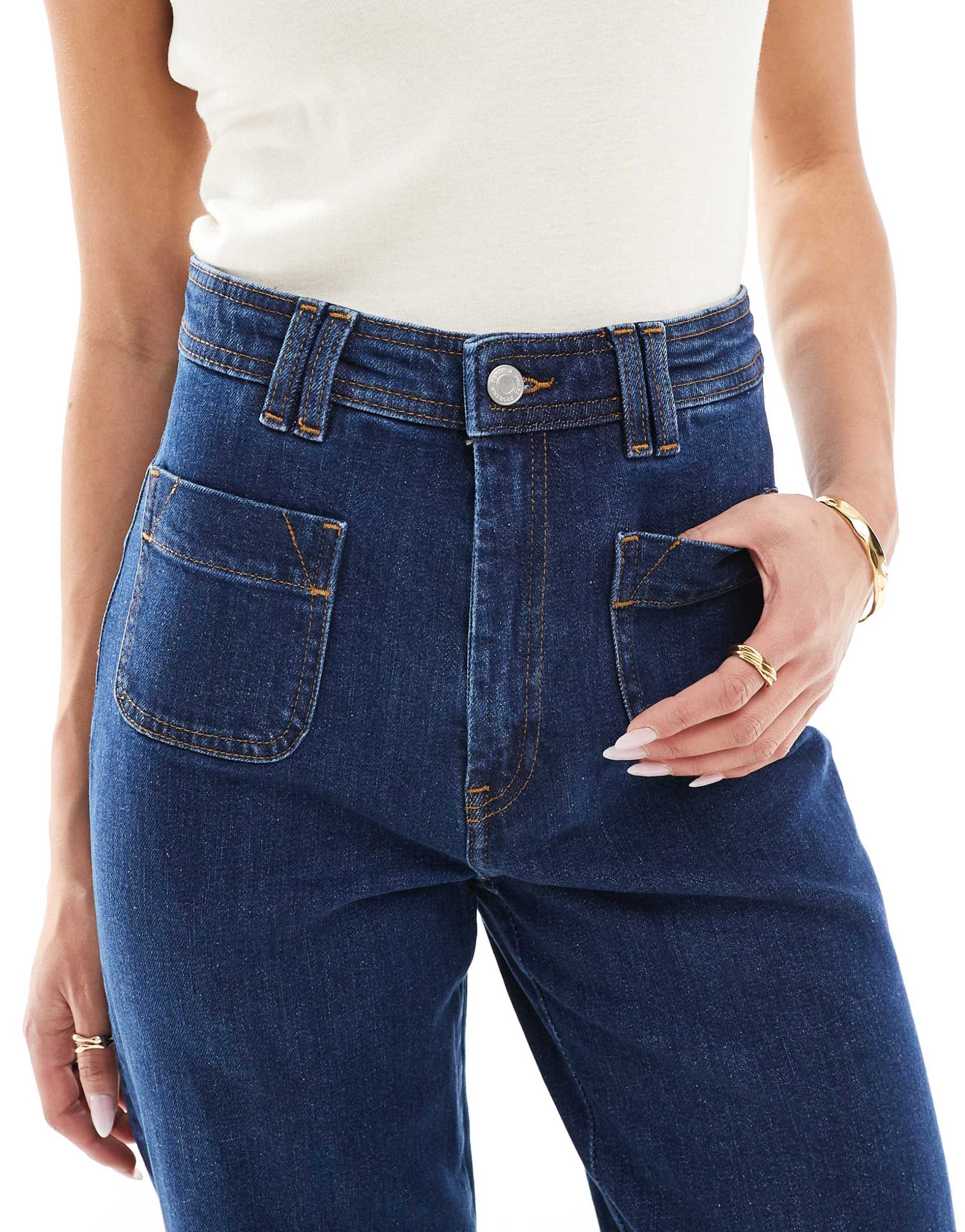 High Rise Flared Jeans with Patch Pockets in Dark Blue Wash